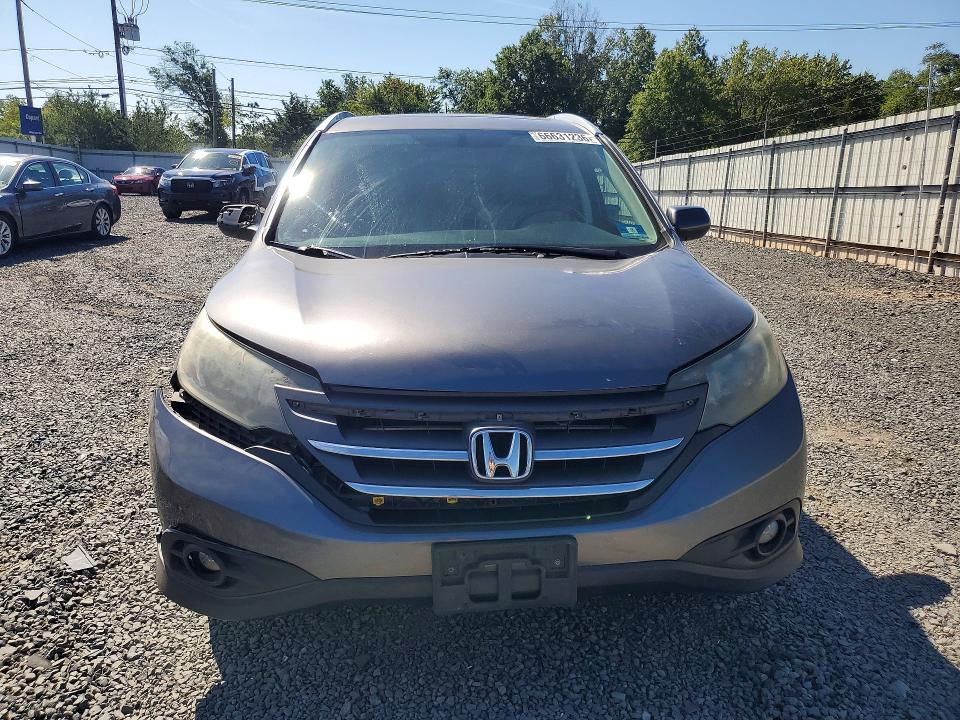 Photo 5 from auction – 2014 HONDA CR-V with VIN 2HKRM4H70EH608115