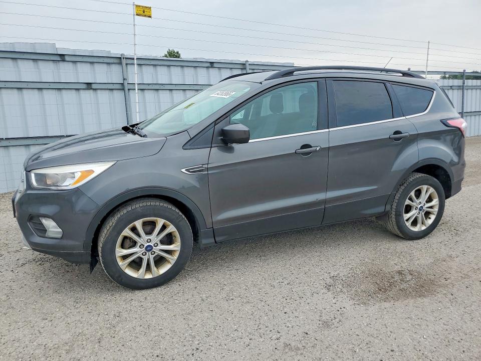 FORD ESCAPE 2018 with VIN 1FMCU0GD7JUB57802 - Photo from auction
