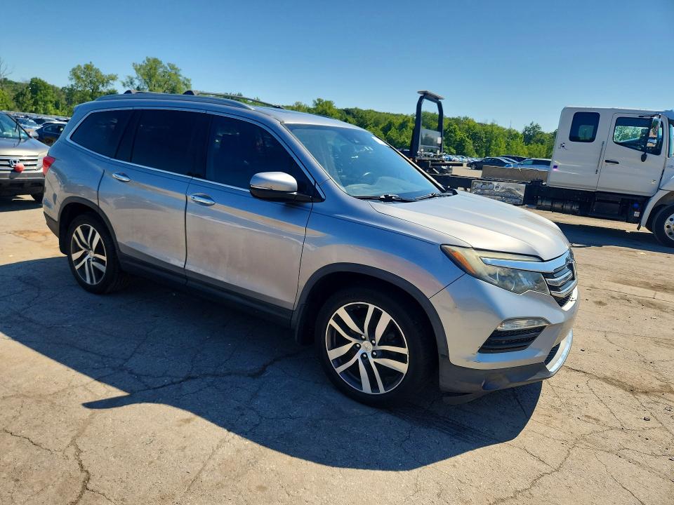 Photo 4 from auction – 2016 HONDA PILOT with VIN 5FNYF6H03GB029805