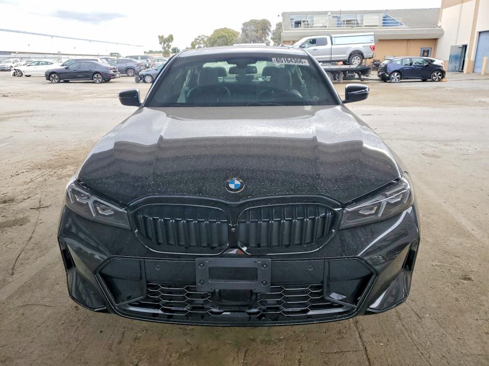 Photo 5 from auction – 2026 BMW 330I with VIN 3MW69CW06T8G11375