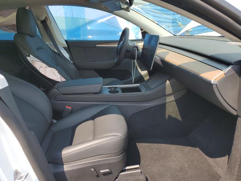 Photo 7 from auction – 2023 TESLA MODEL Y with VIN 7SAYGDEE9PA119297