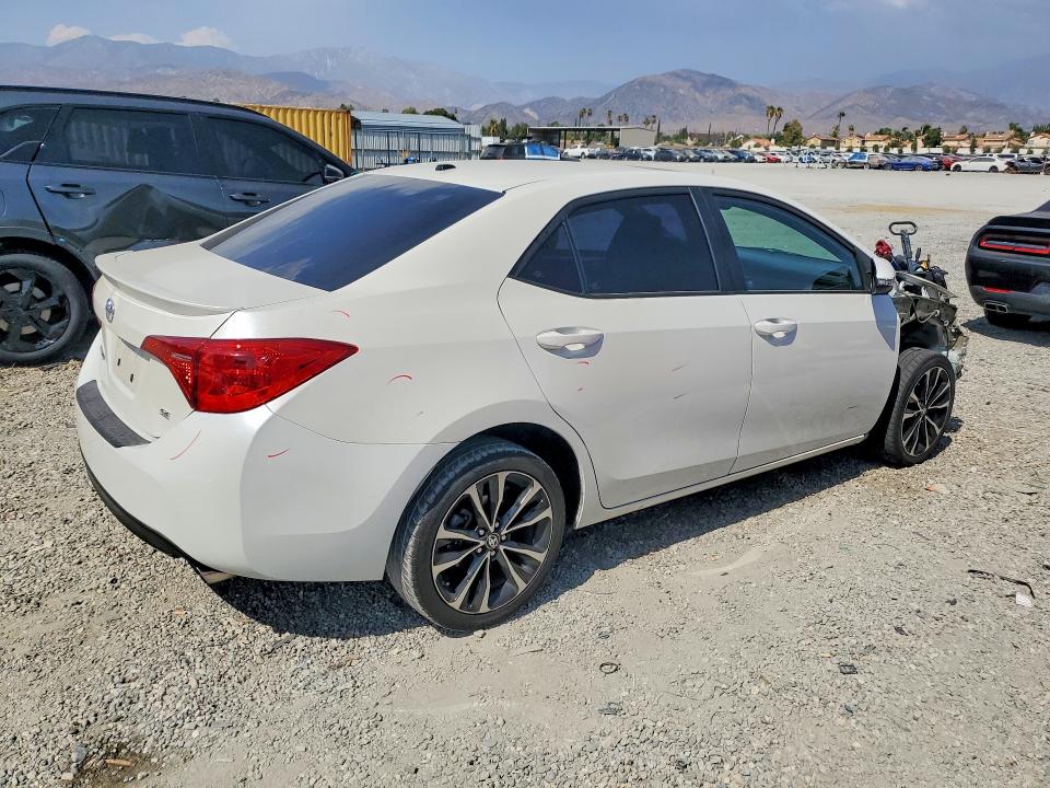 Photo 3 from auction – 2017 TOYOTA COROLLA with VIN 5YFBURHE0HP613206