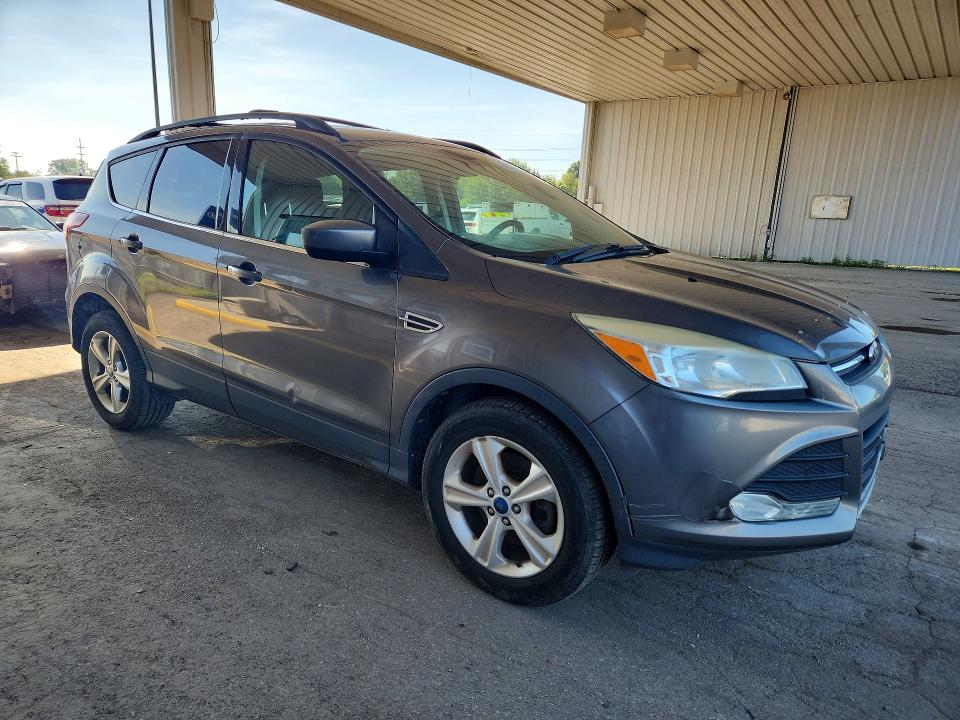 Photo 4 from auction – 2014 FORD ESCAPE with VIN 1FMCU9GXXEUA26156
