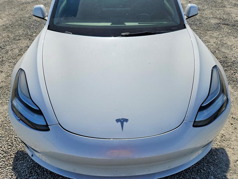 Photo 11 from auction – 2022 TESLA MODEL 3 with VIN 5YJ3E1EA8NF298750