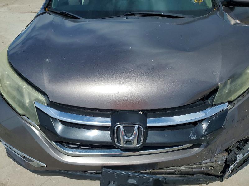 Photo 12 from auction – 2015 HONDA CR-V with VIN 5J6RM4H73FL042409