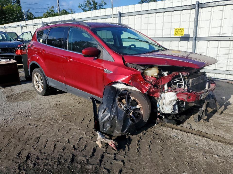 Photo 4 from auction – 2018 FORD ESCAPE with VIN 1FMCU9G92JUC41588