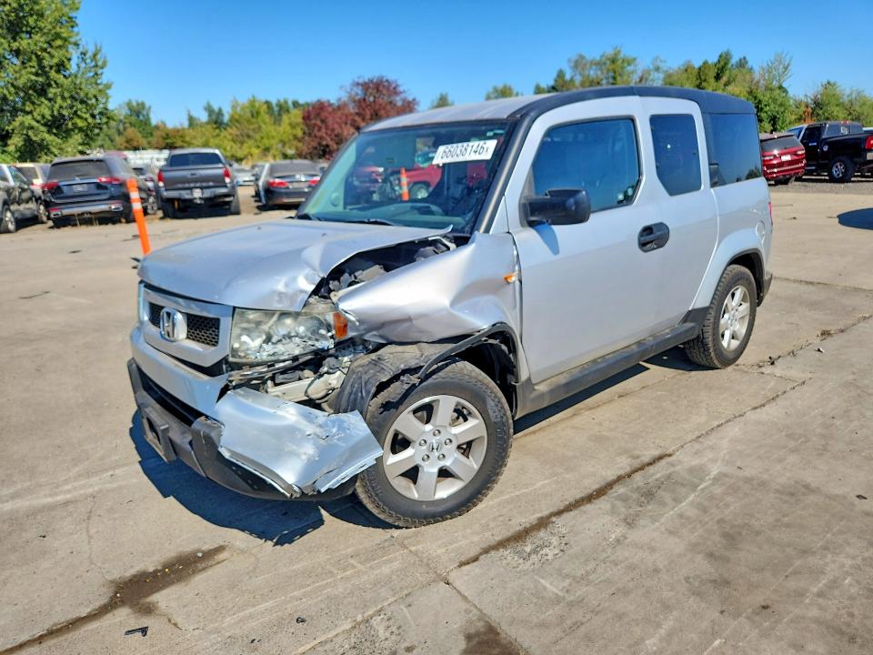HONDA ELEMENT 2011 with VIN 5J6YH2H76BL003859 - Photo from auction