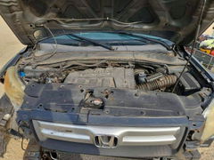 Photo 12 from auction – 2006 HONDA PILOT with VIN 5FNYF28146B046175