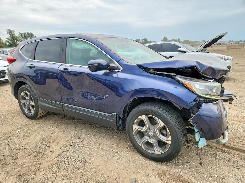 Photo 4 from auction – 2019 HONDA CR-V with VIN 7FARW2H88KE015379