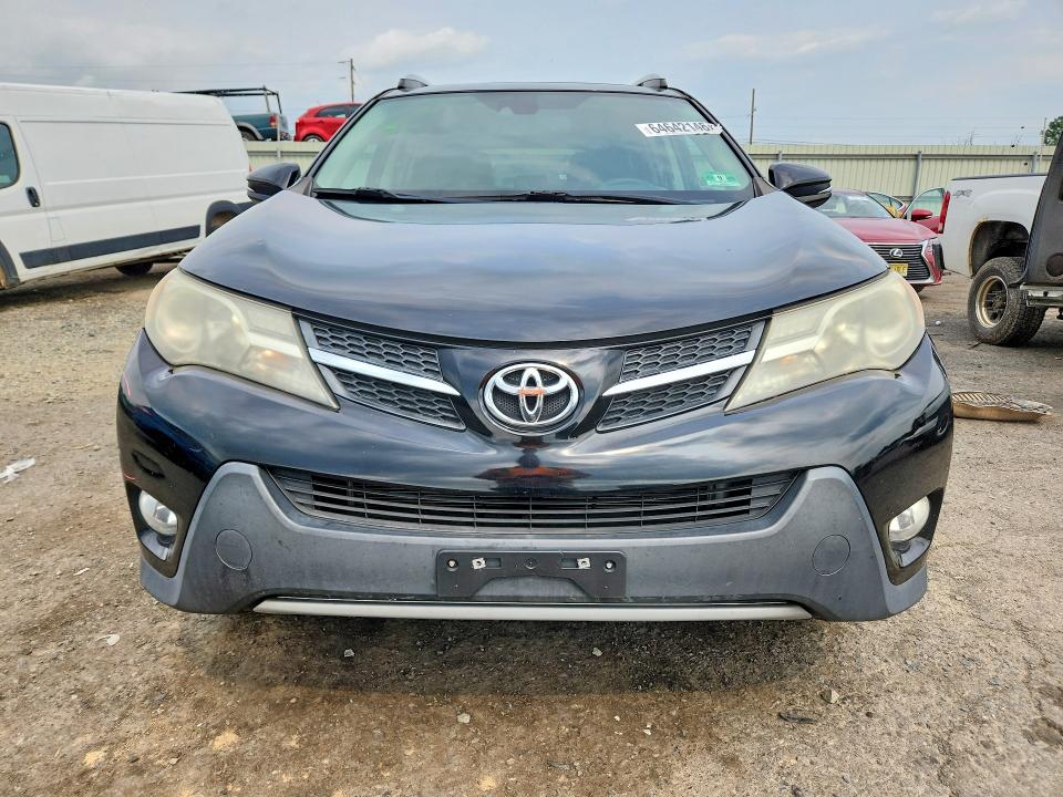 Photo 5 from auction – 2014 TOYOTA RAV4 with VIN 2T3DFREV2EW131975