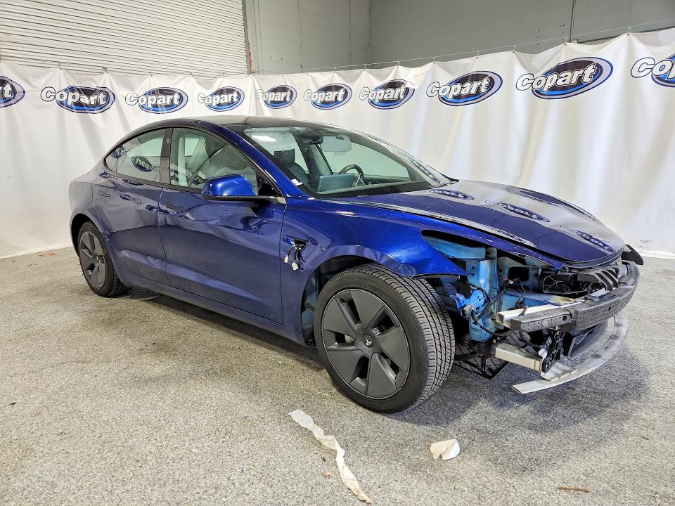 Photo 4 from auction – 2022 TESLA MODEL 3 with VIN 5YJ3E1EA4NF370365