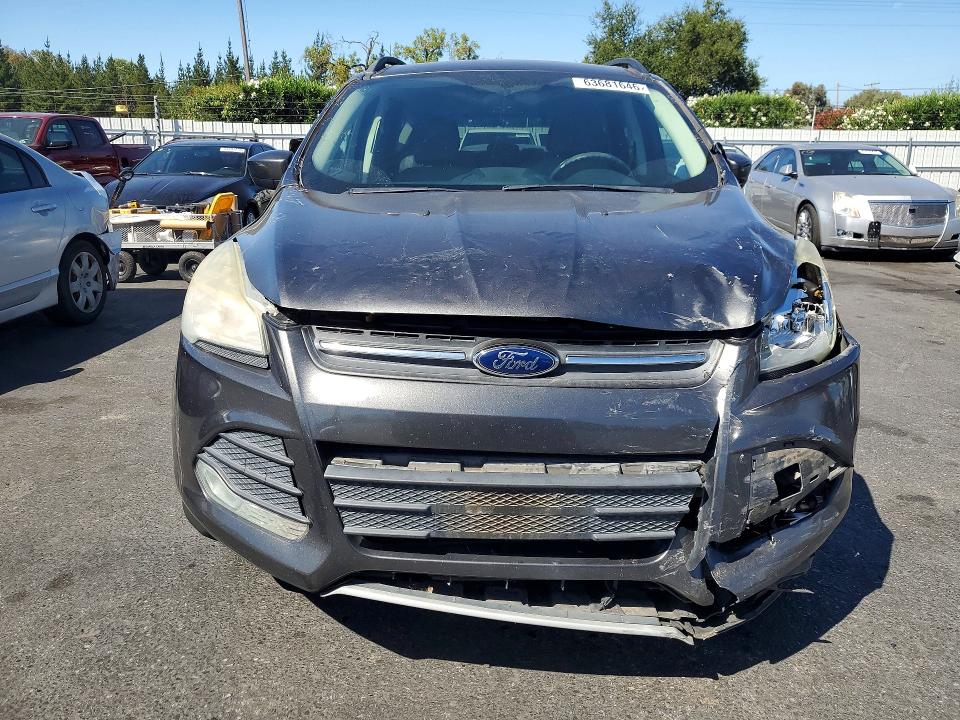 Photo 5 from auction – 2015 FORD ESCAPE with VIN 1FMCU0GX5FUC66079