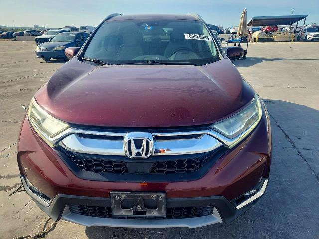 Photo 5 from auction – 2018 HONDA CR-V with VIN 7FARW2H91JE097530