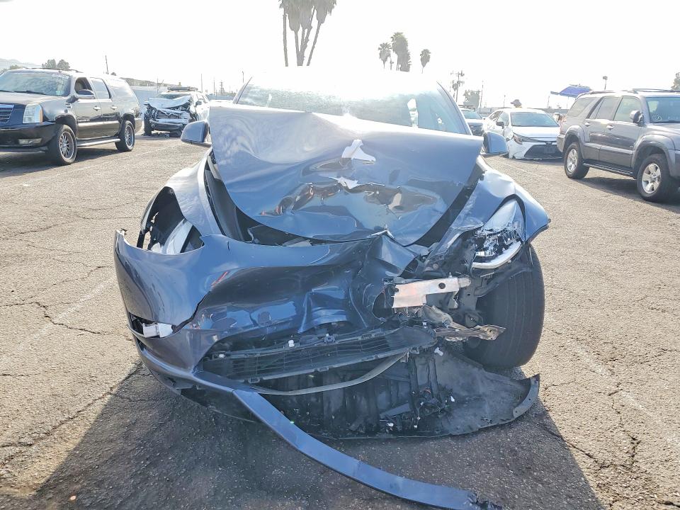 Photo 5 from auction – 2023 TESLA MODEL Y with VIN 7SAYGDEE6PA027337