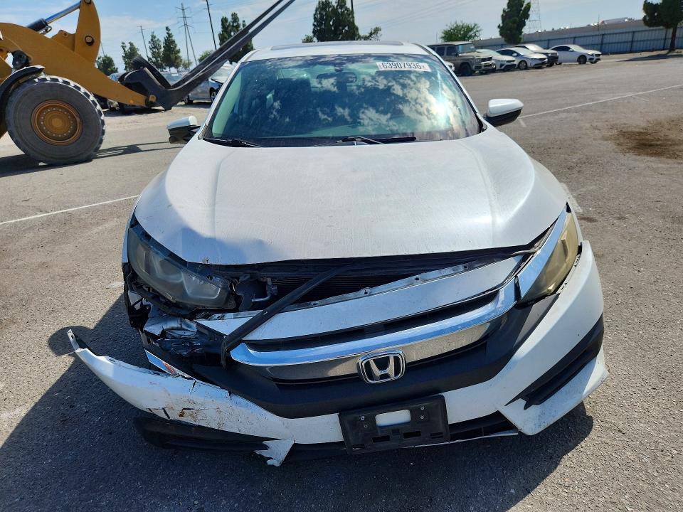 Photo 5 from auction – 2016 HONDA CIVIC with VIN 19XFC2F76GE225428