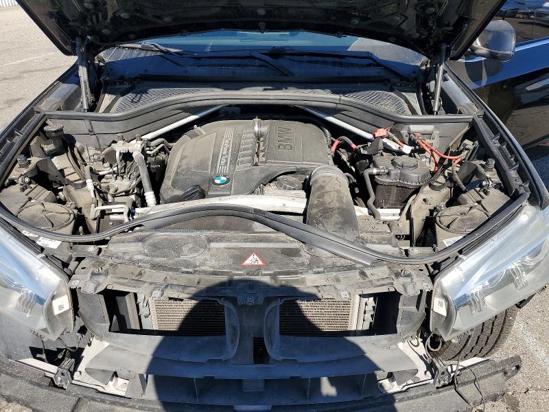 Photo 12 from auction – 2014 BMW X5 with VIN 5UXKR2C52E0H32012