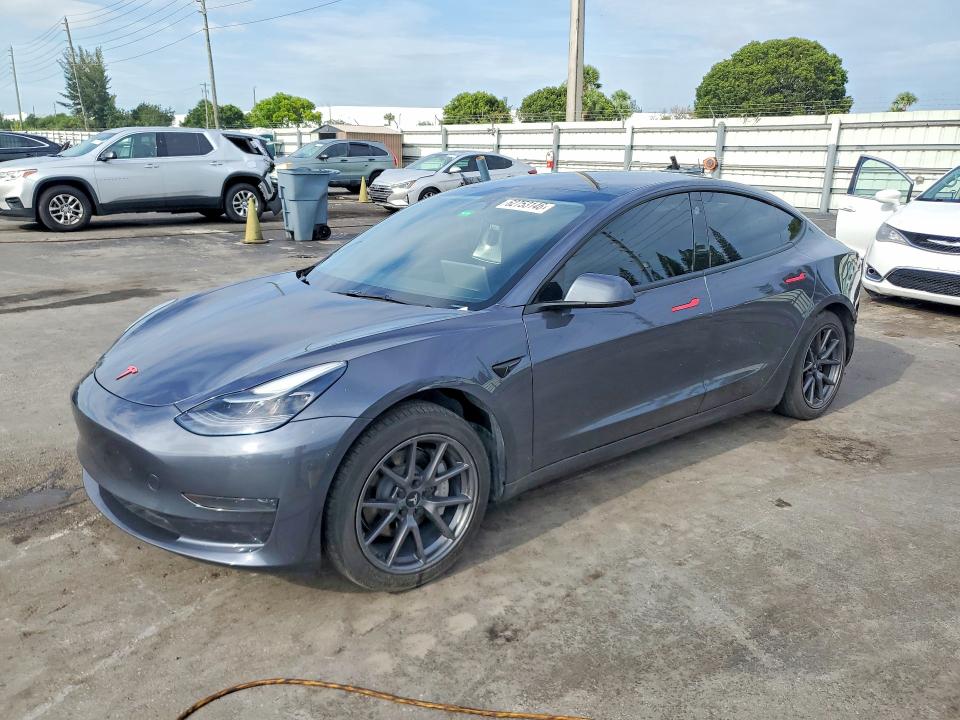TESLA MODEL 3 2023 с VIN 5YJ3E1EA5PF678003 - Снимка от търг