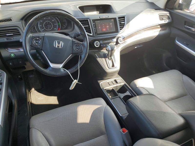 Photo 8 from auction – 2015 HONDA CR-V with VIN 2HKRM4H77FH606038