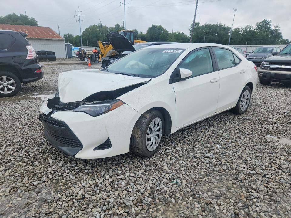 TOYOTA COROLLA 2019 with VIN 5YFBURHE9KP857413 - Photo from auction