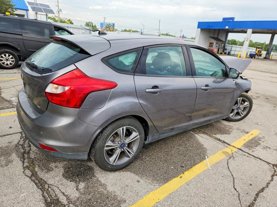 Снимка 3 от търг – 2014 FORD FOCUS с VIN 1FADP3K25EL317054