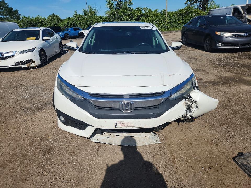 Photo 5 from auction – 2016 HONDA CIVIC with VIN 2HGFC1F90GH114455