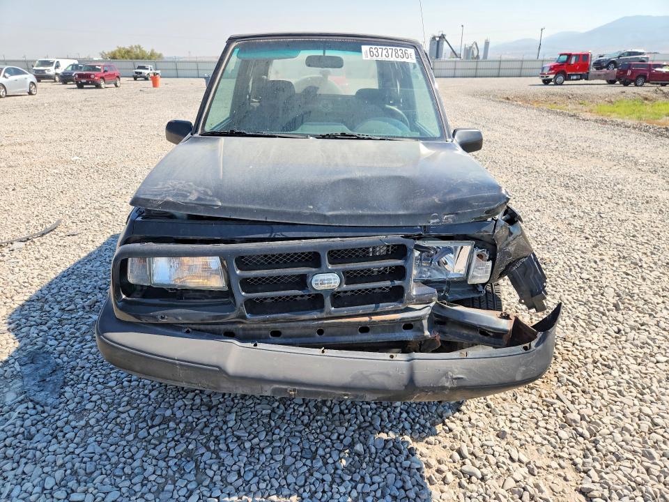 Photo 5 from auction – 1996 GEO TRACKER with VIN 2CNBJ1861T6951609