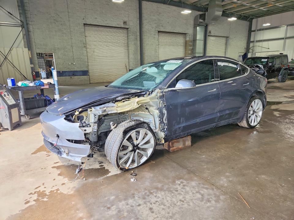 TESLA MODEL 3 2018 with VIN 5YJ3E1EA5JF153286 - Photo from auction