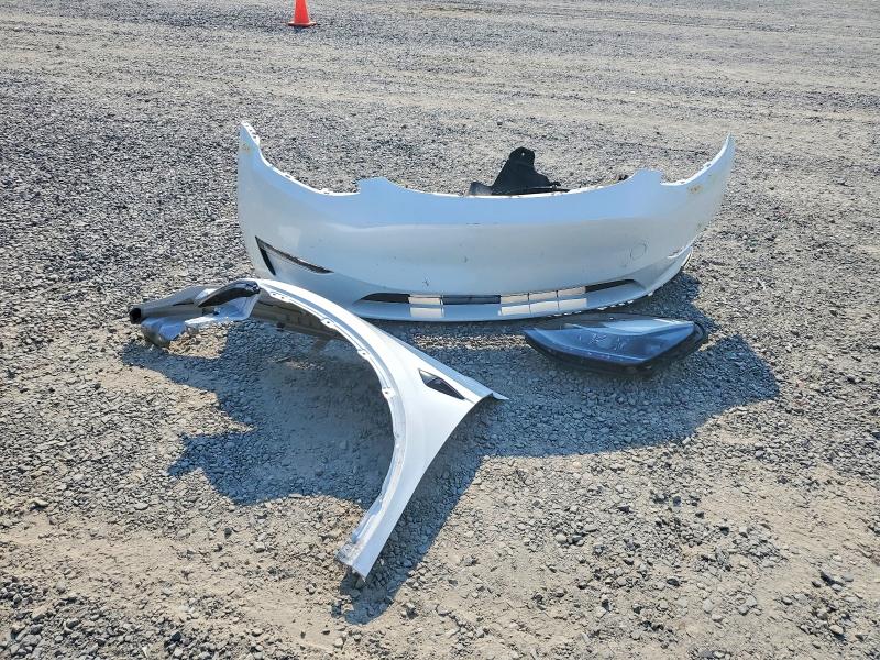 Photo 13 from auction – 2023 TESLA MODEL Y with VIN 7SAYGAEE5PF624075