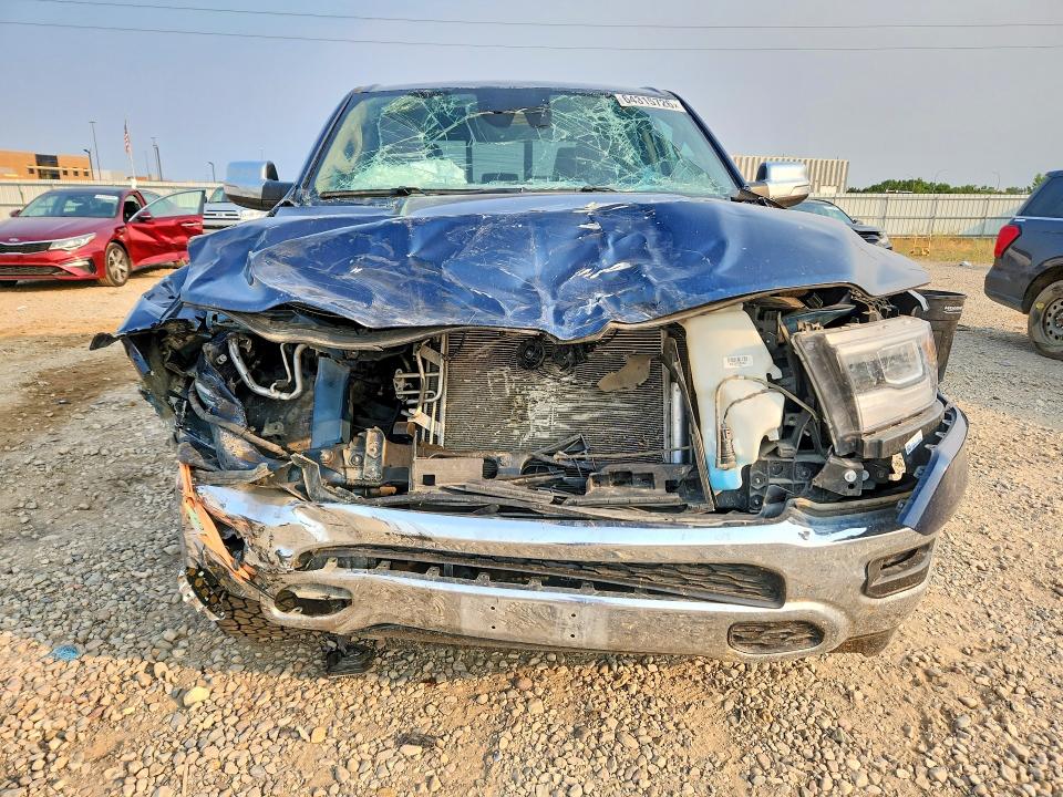 Foto 5 de la subasta – 2021 RAM 1500 con VIN 1C6SRFJT2MN805718