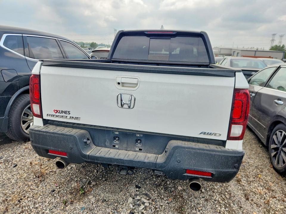 Photo 6 from auction – 2023 HONDA RIDGELINE with VIN 5FPYK3F80PB020599
