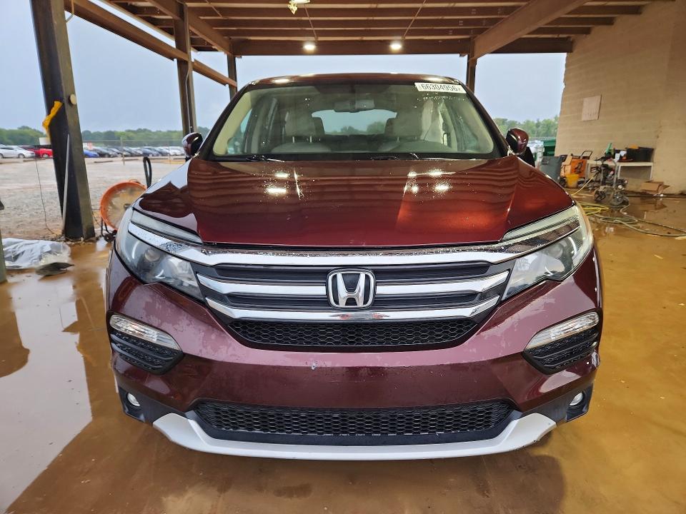 Photo 5 from auction – 2016 HONDA PILOT with VIN 5FNYF5H75GB043034