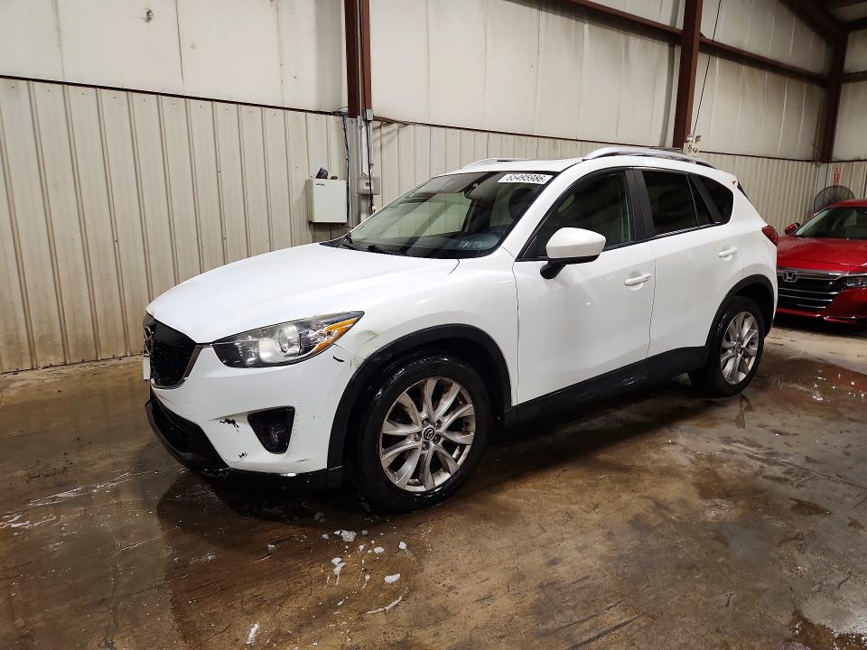 MAZDA CX-5 2014 with VIN JM3KE4DY7E0399246 - Photo from auction