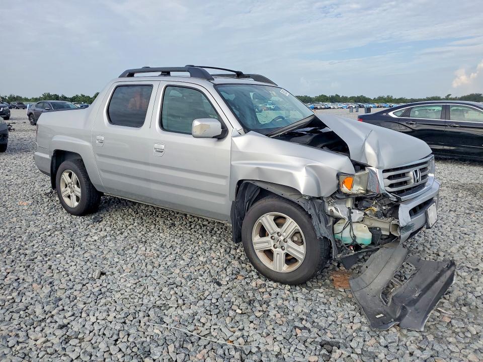 Photo 4 from auction – 2014 HONDA RIDGELINE with VIN 5FPYK1F55EB006771
