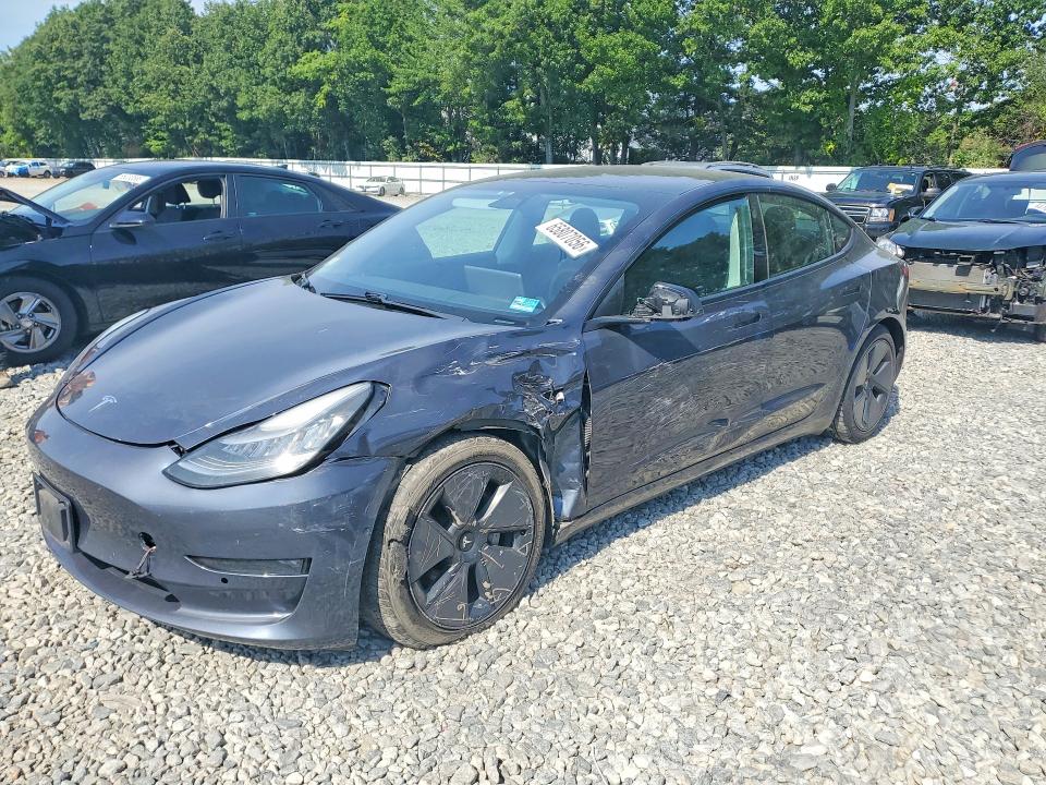 TESLA MODEL 3 2021 with VIN 5YJ3E1EB9MF853227 - Photo from auction