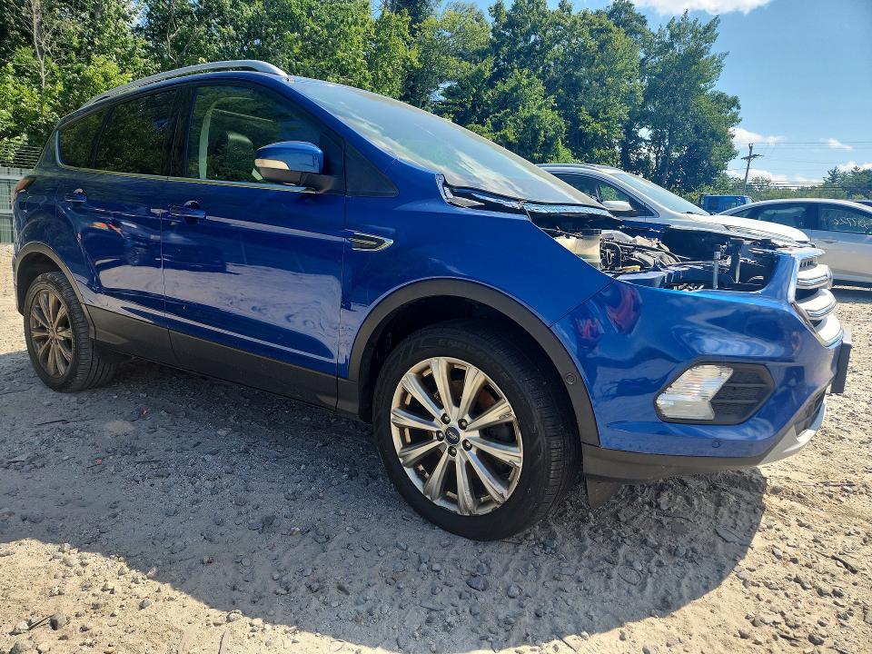 Photo 4 from auction – 2018 FORD ESCAPE with VIN 1FMCU9J9XJUA77077