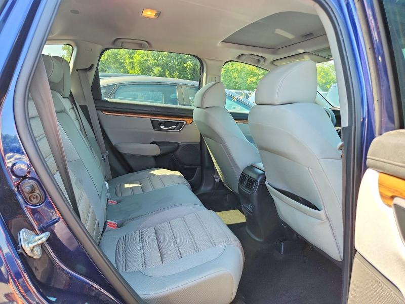 Photo 11 from auction – 2018 HONDA CR-V with VIN 7FARW2H56JE014753