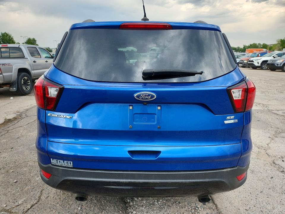 Photo 6 from auction – 2019 FORD ESCAPE with VIN 1FMCU9GD8KUB03530