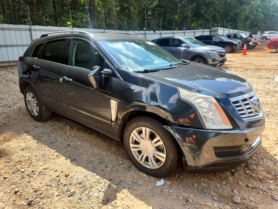 Photo 4 from auction – 2014 CADILLAC SRX with VIN 3GYFNBE38ES645211
