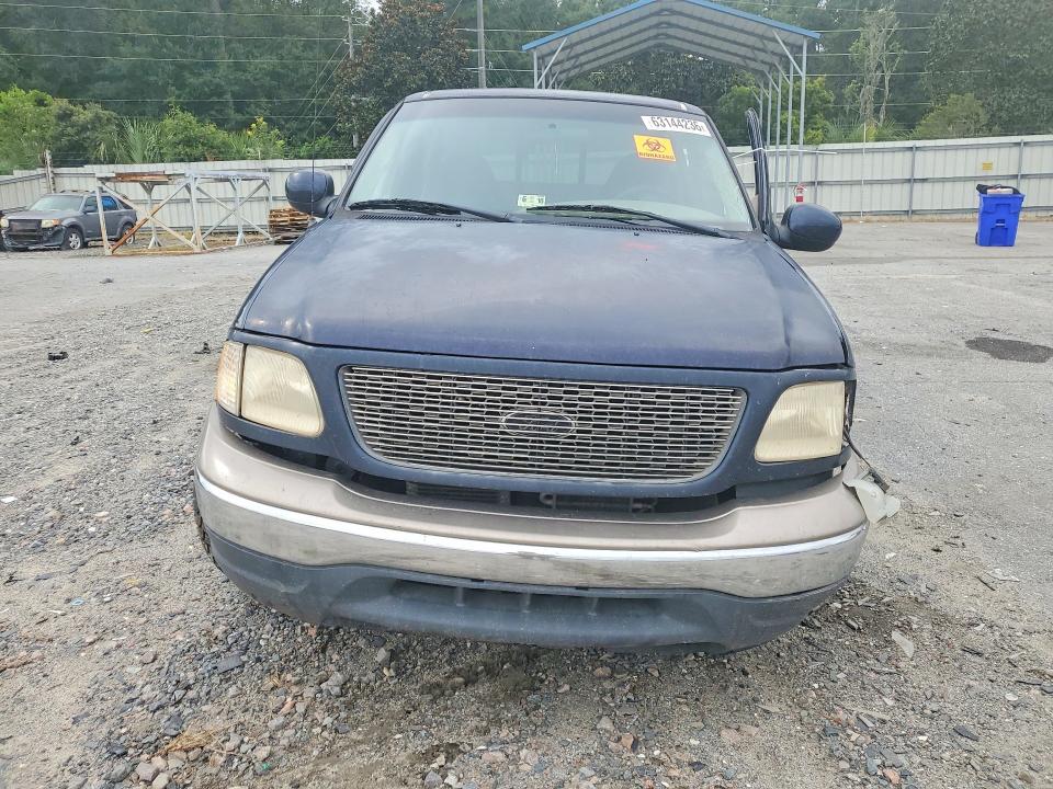 Photo 5 from auction – 2000 FORD F150 with VIN 1FTRX17W3YNA01564