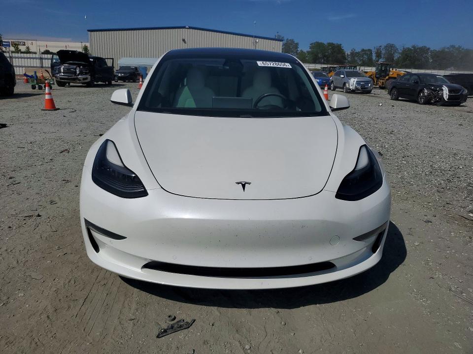 Photo 5 from auction – 2021 TESLA MODEL 3 with VIN 5YJ3E1EA1MF920748