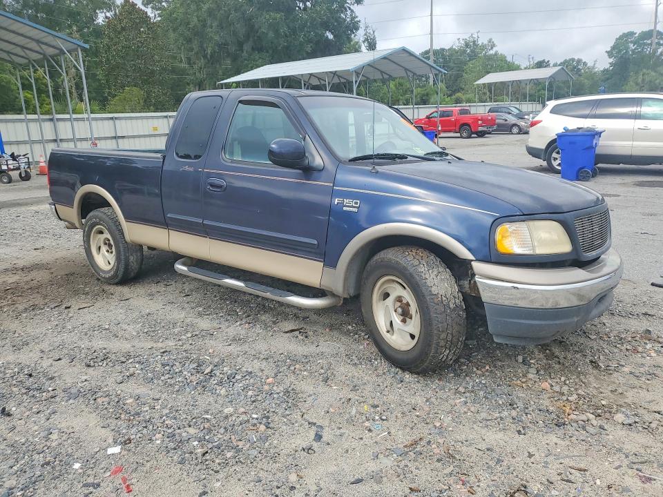 Photo 4 from auction – 2000 FORD F150 with VIN 1FTRX17W3YNA01564