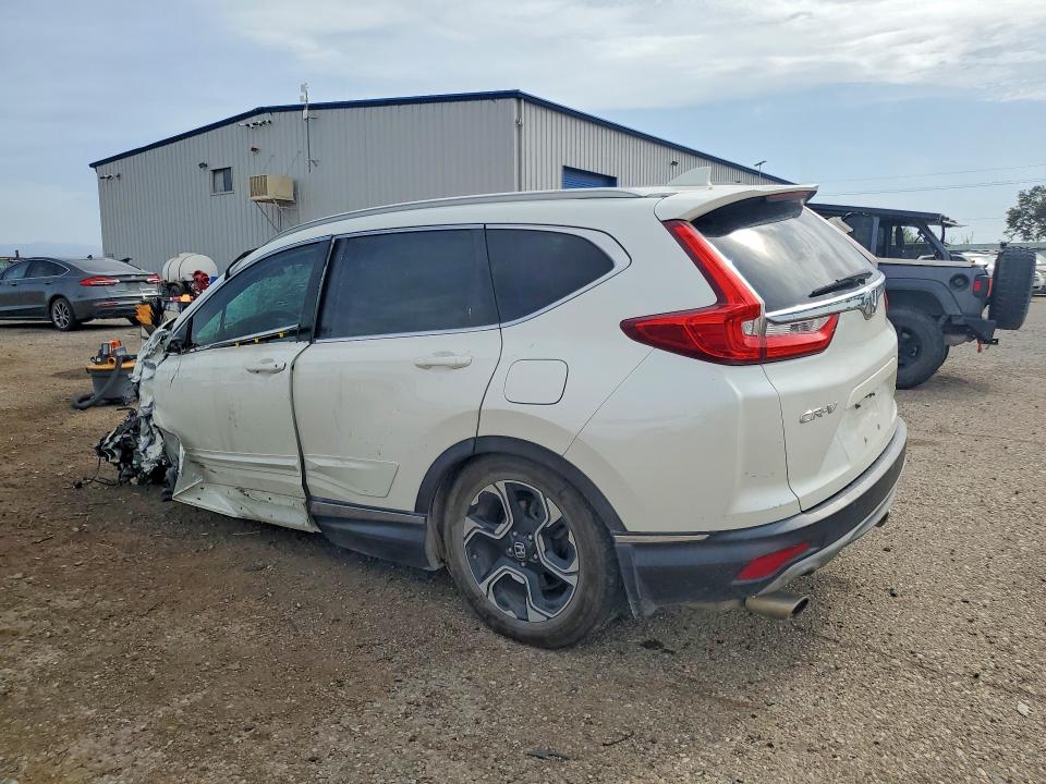 Photo 2 from auction – 2017 HONDA CR-V with VIN 2HKRW1H93HH517130
