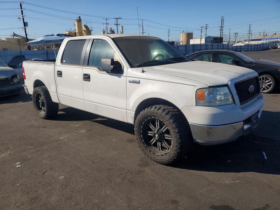 Photo 4 from auction – 2005 FORD F150 with VIN 1FTPW12505FA13735