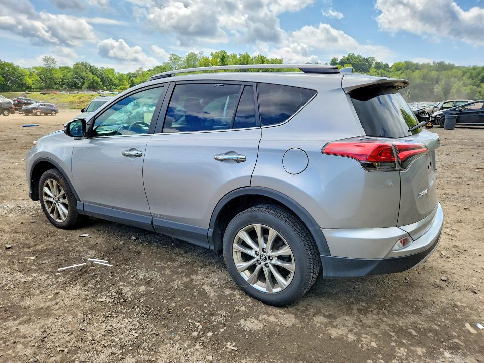 Photo 2 from auction – 2018 TOYOTA RAV4 with VIN 2T3DFREV7JW855669