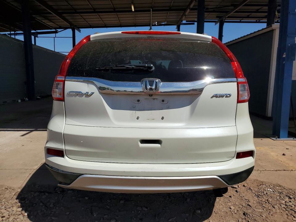 Photo 6 from auction – 2015 HONDA CR-V with VIN 5J6RM4H7XFL025896