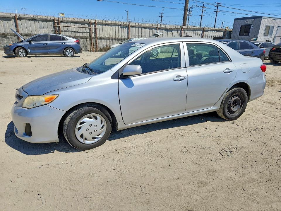 TOYOTA COROLLA 2012 with VIN JTDBU4EE8C9180174 - Photo from auction