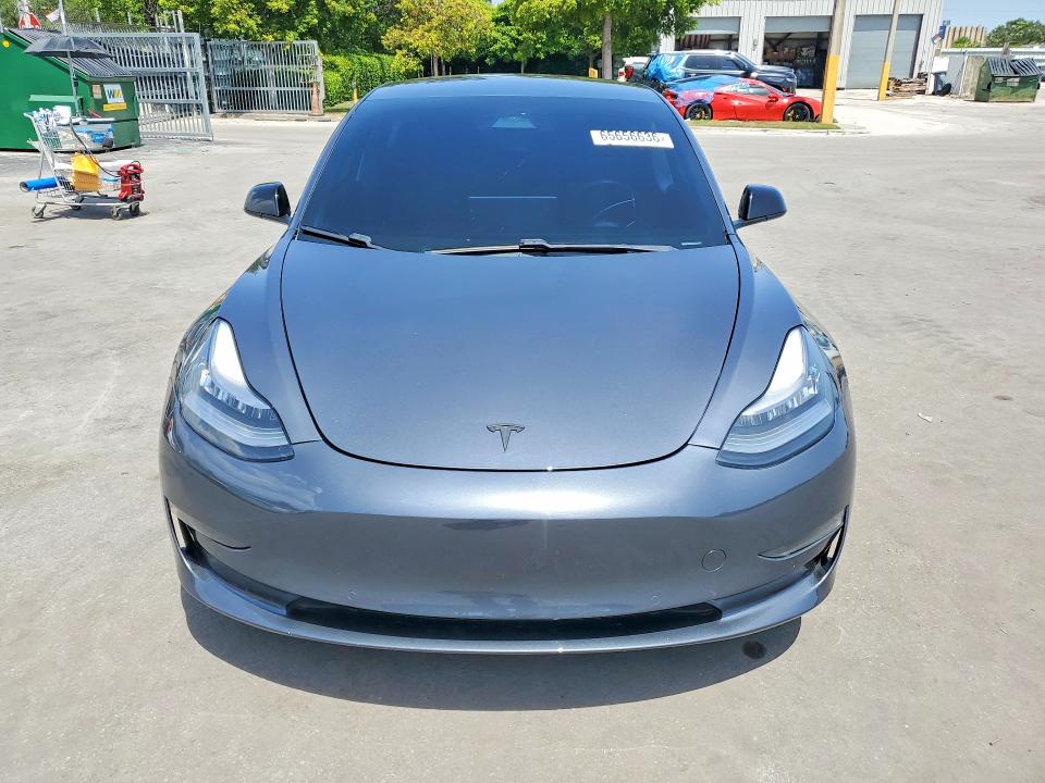 Photo 5 from auction – 2021 TESLA MODEL 3 with VIN 5YJ3E1EA8MF854022