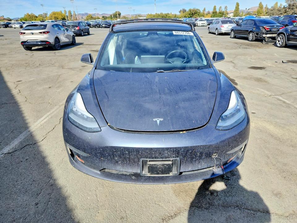 Photo 5 from auction – 2018 TESLA MODEL 3 with VIN 5YJ3E1EB8JF066314