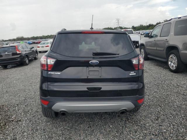 Photo 6 from auction – 2018 FORD ESCAPE with VIN 1FMCU0GD5JUA79617