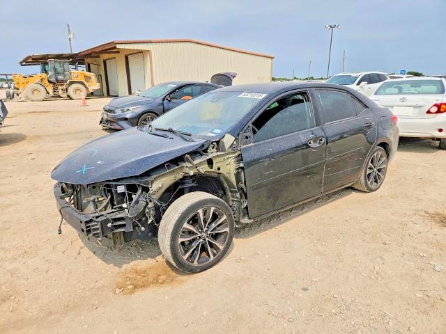 TOYOTA COROLLA 2018 with VIN 5YFBURHE8JP800604 - Photo from auction